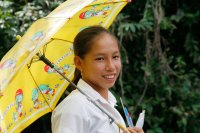 Schoolgirl with umbrella