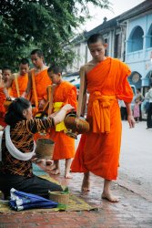 Monks collecting arms, Luang Prabang